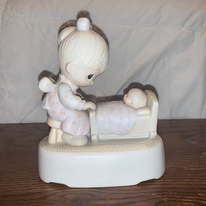 “The Hand That Rocks The Future” Precious Moment